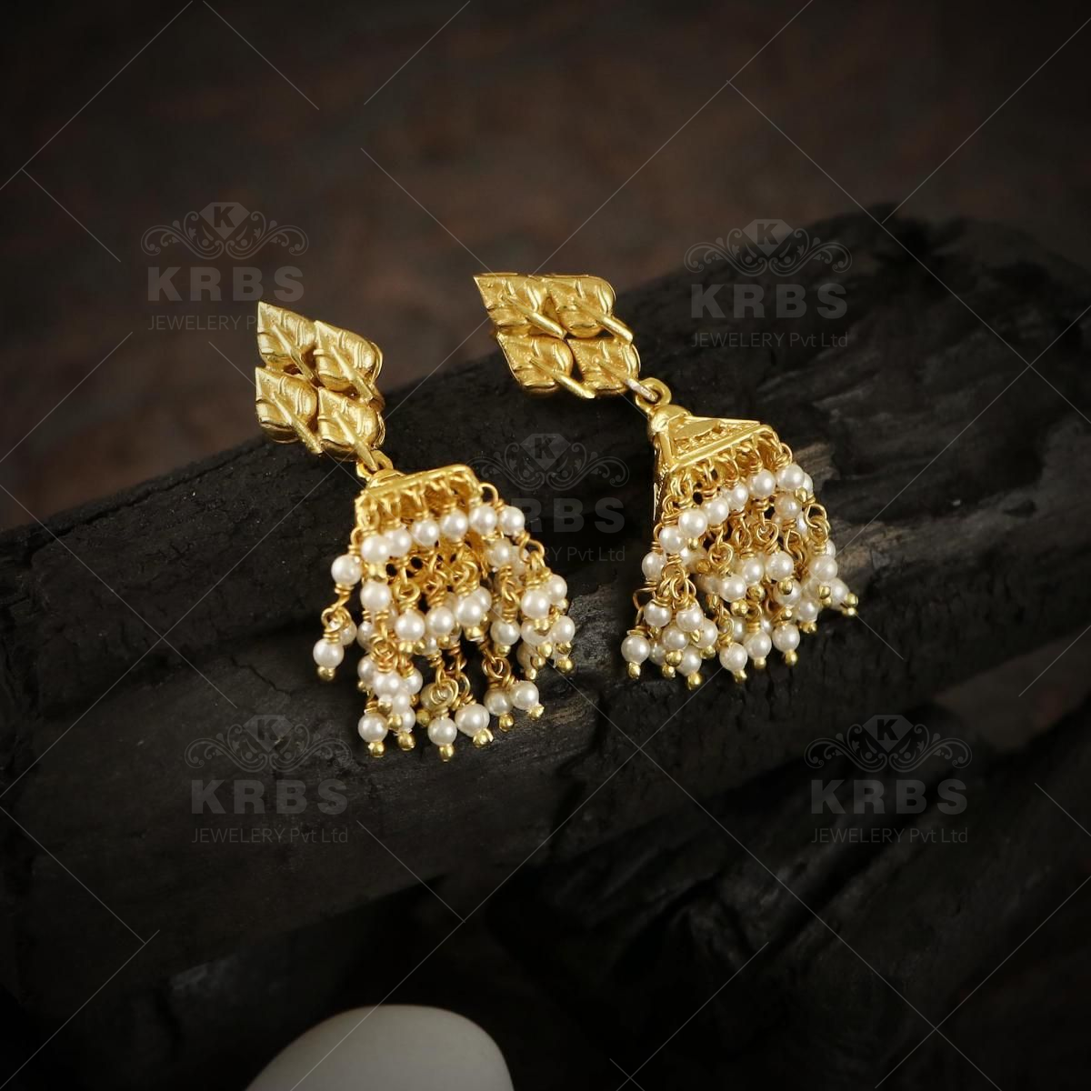 Gold Finish Kundan & Shell Pearl Jhumka Earrings Design by Paisley Pop at  Pernia's Pop Up Shop 2024